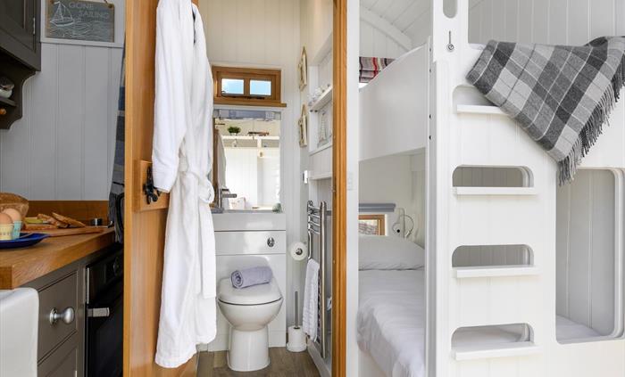 Here you can see how the bunks and bathroom work into the space at this end of the hut.  They are useful for storage or for when friends travel togeth